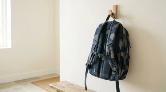School backpack with ergonomic features highlighting proper weight distribution and spinal alignment